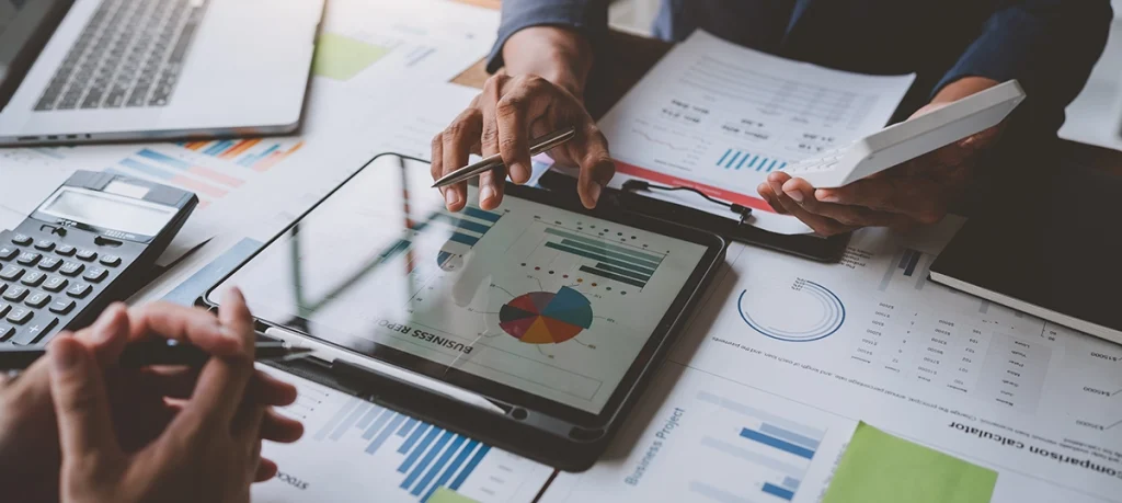 Accountant using website on tablet to assist with client