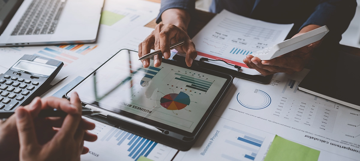 Accountant using website on tablet to assist with client