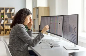 Woman doing bookkeeping and stressing